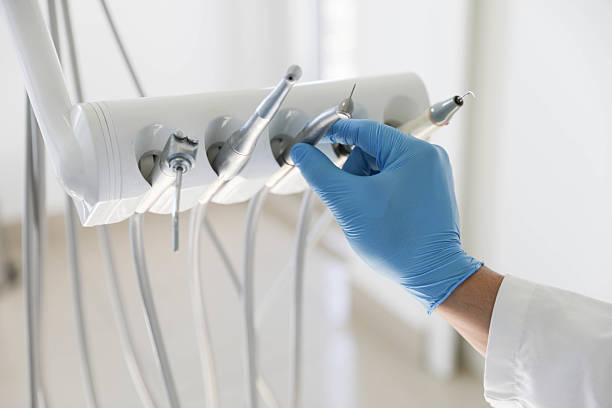 Professional Tooth Extraction technician working in Van Buren, AR